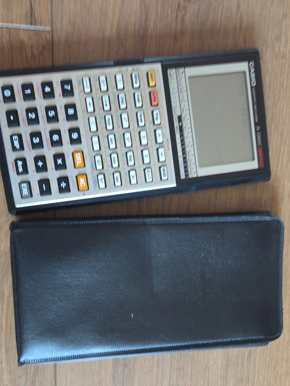 Casio Scientific Calculator in Black and White with Leather Case